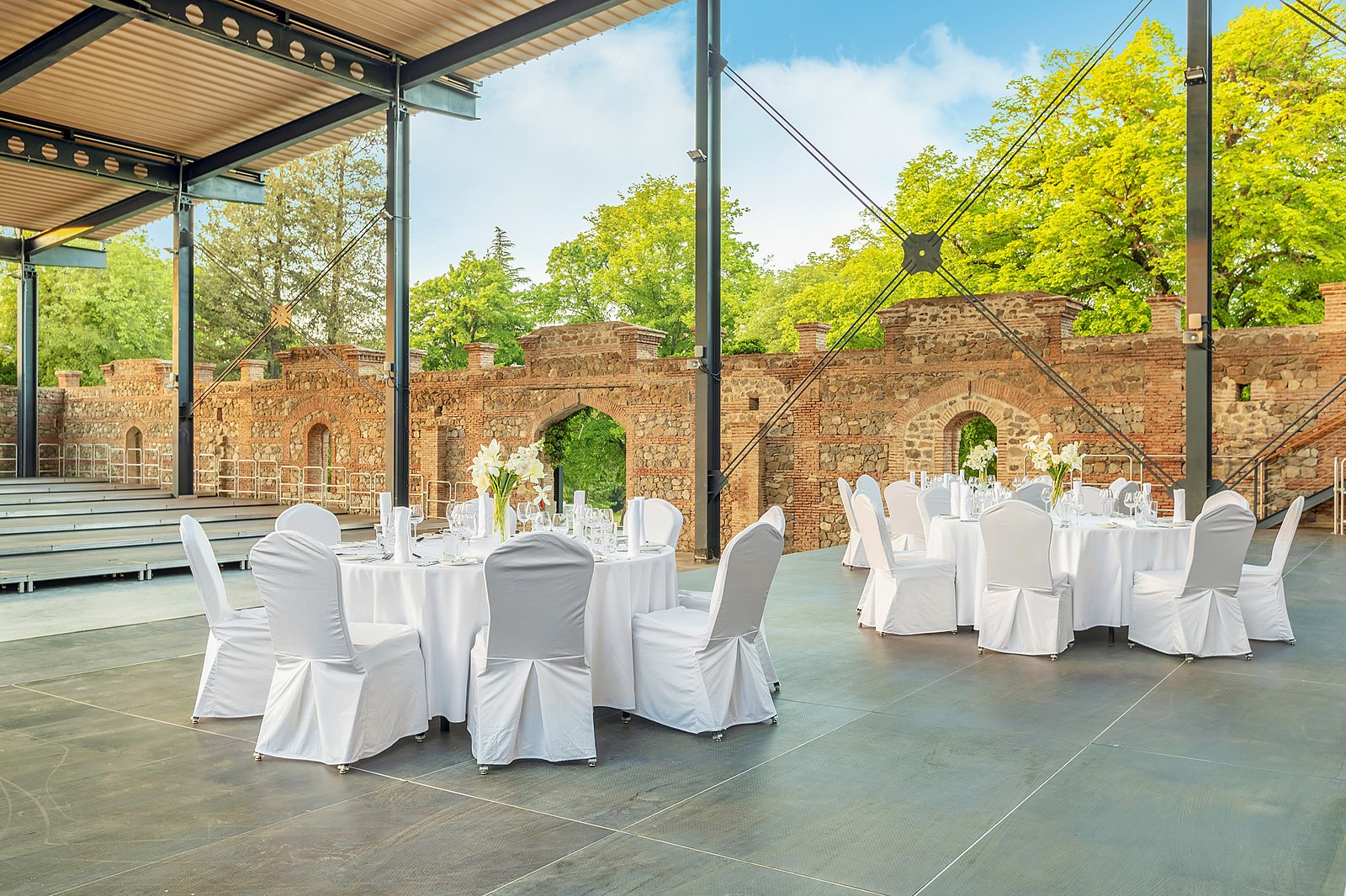 Xavier Fabre's open-air brick and stone amphitheater set for a wedding dinner at Tsinandali Estate